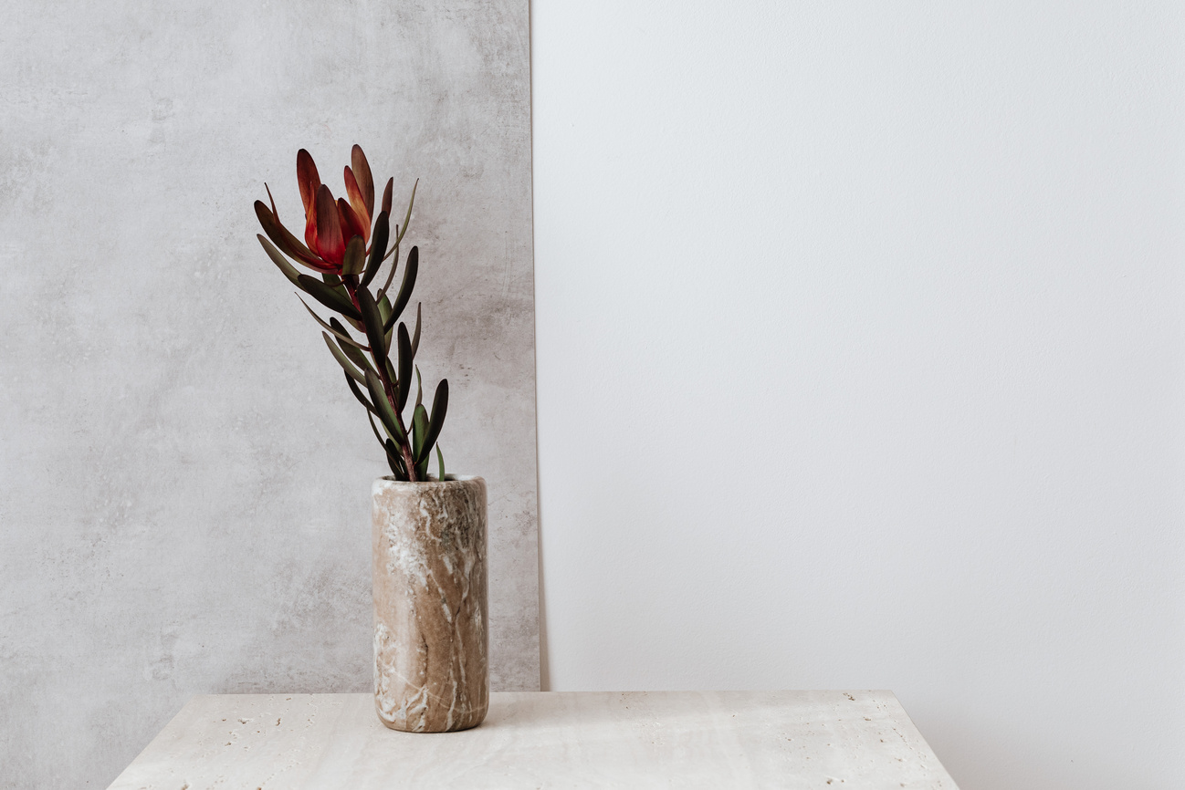 A Marble Vase over a Marble Top Table